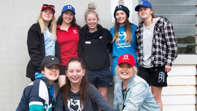 Redcliffe teenager Ainsleigh Friedrich (bottom right) has become a HeatKids Teen Camp camp champ.