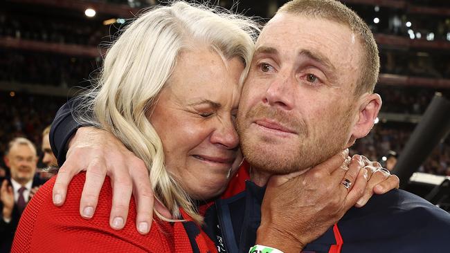 PERTH. 25/09/2021. AFL Grand Final. Melbourne vs Western Bulldogs at Optus Stadium, Perth. . An emotional Simon Goodwin, senior coach of the Demons hugs president Kate Roffey after game . Photo by Michael Klein