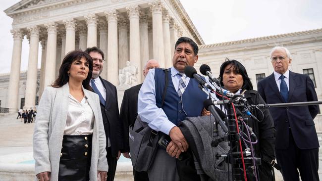 Parents of Nohemi Gonzalez discuss the case against Google outside the Supreme Court on Tuesday. Picture: AFP