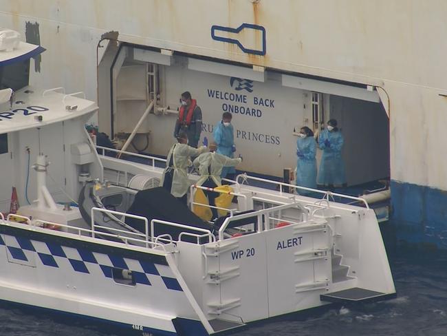 Medics assess crew on board the Ruby Princess on Thursday. Picture: Seven News