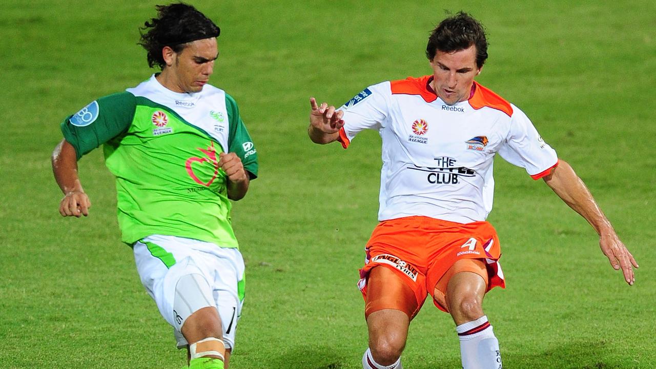 Shane Stefanutto of the Roar contests the ball with David Williams of the Fury in 2010. Picture: Ian Hitchcock/Getty Images