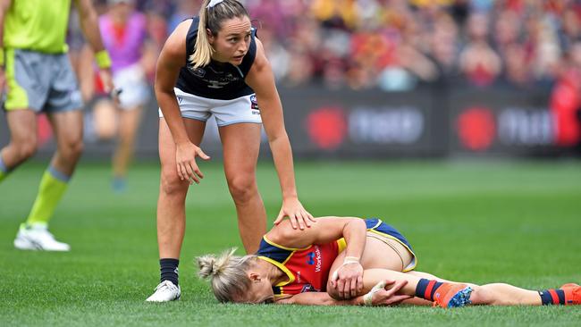 31/03/19 - AFLW Grand Final. Adelaide vs Carlton at Adelaide Oval. Adelaide's 13 Erin Phillips comforted by Carlton player. Picture: Tom Huntley