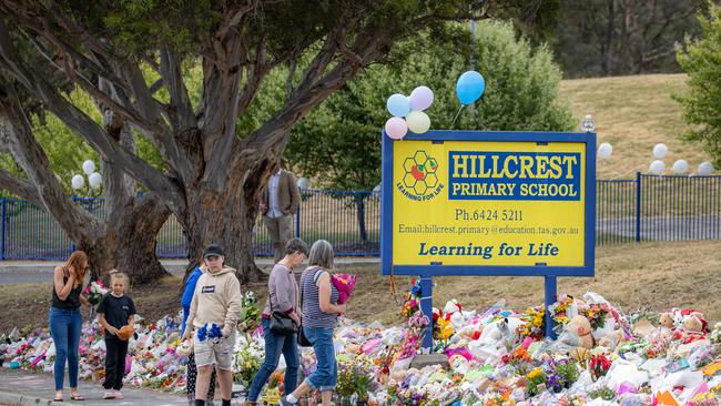 Mourners pay tribute to the children who died after  gust of wind swept away a jumping castle at Hillcrest Primary School Devonport Tasmania. Picture: Jason Edwards