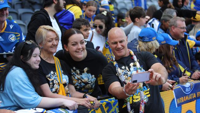 Parramatta coach Brad Arthur snaps a selfie with fans after the Parramatta Eels’ loss to Penrith Panthers. Picture: Richard Dobson