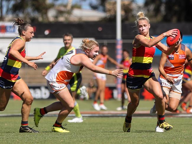 Crows co-captain Erin Phillips evades Tait Mackrill of the Giants. Picture: Matt Turner/AFL Photos