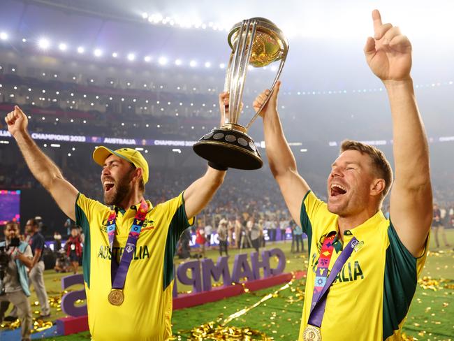 Glenn Maxwell (L) and David Warner celebrate Australia’s triumph at the 2023 World Cup in India. Picture: Getty