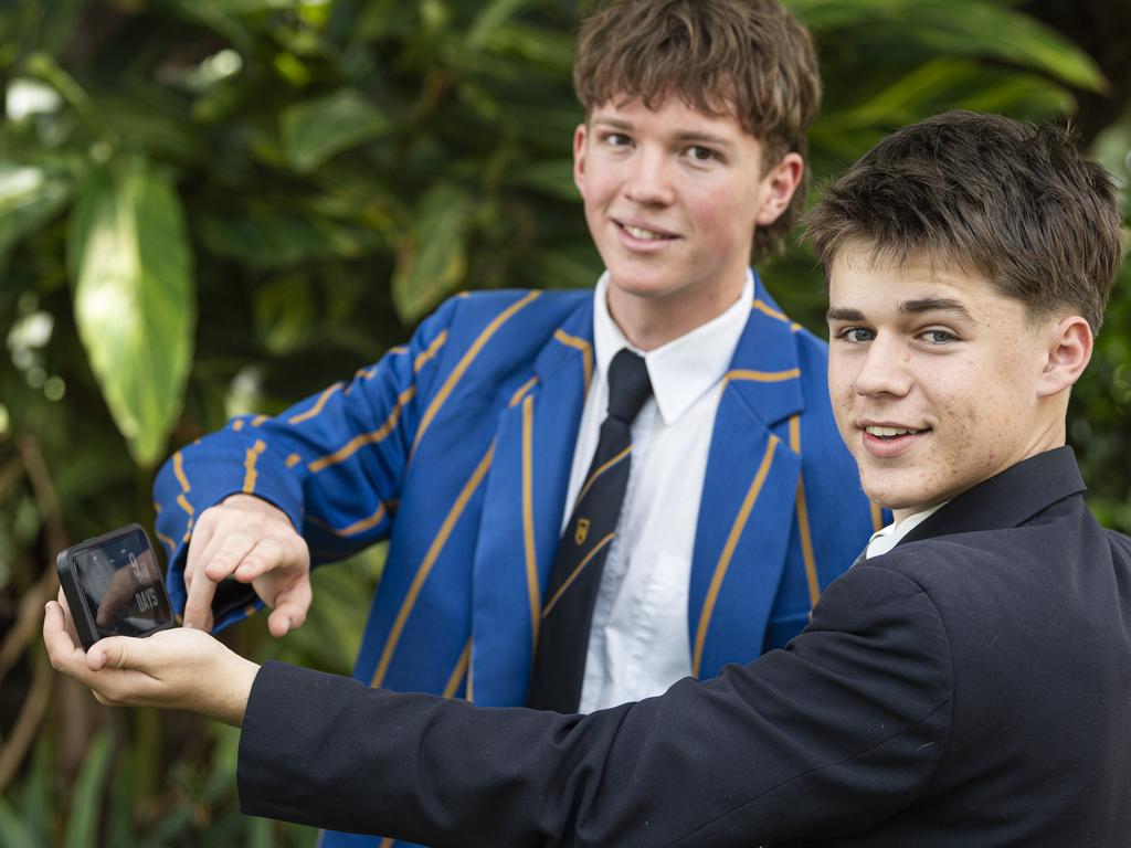 St Mary's College captain Ethan Payne (front) and Toowoomba Grammar School year 12 student Steven Crocker watch the video produced by a student-led domestic violence committee made of members of the two schools, Friday, October 18, 2024. Picture: Kevin Farmer