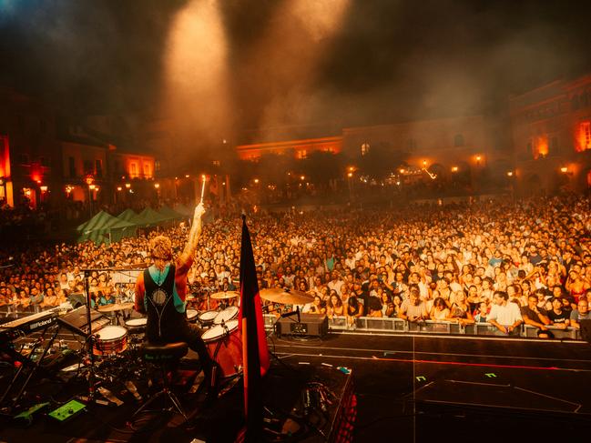 Xavier Rudd in front of a large crowd performing at Barcelona’s Poble Espanyol in September last year. Photo Josh Hickie