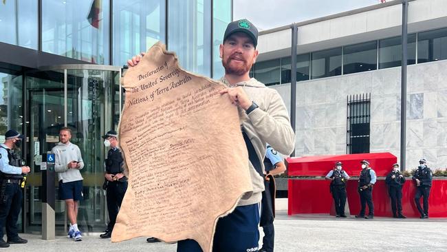 Rayne Orion Crowe AKA Rayne Huddleston AKA Urulah protesting outside the ACT Law Courts. Picture: Facebook