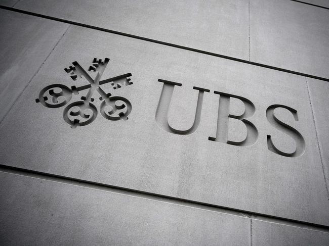 (FILES) In this file photo taken on May 08, 2019 the logo of Swiss banking giant UBS engraved on the wall is seen on its headquarters in Zurich. - Appeal hearings by Swiss banking giant UBS over 3.7bn euro money laundering fine are due to take place in Paris on June 2, 2020. (Photo by Fabrice COFFRINI / AFP)