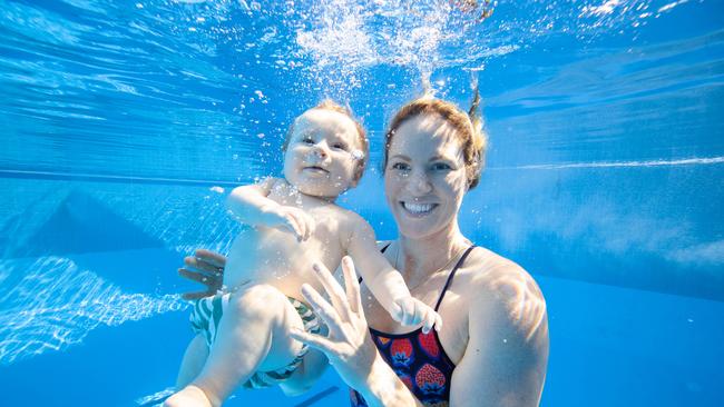 Olympic swimming champion Emily Seebohm swimming with son Sampson at Centenary Pool in Spring Hill. Picture Lachie Millard