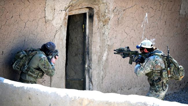 Special Operations Task Group soldiers conduct clearance drills at a training facility at the Multi National Base Tarin Kot. Picture: Department of Defence