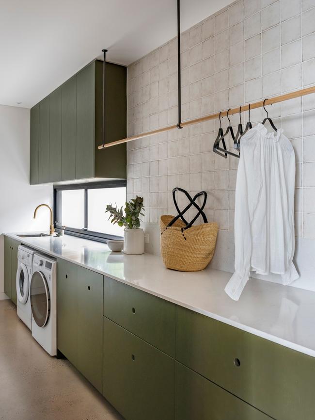 Soothing pops of green in the laundry. Pictures: supplied