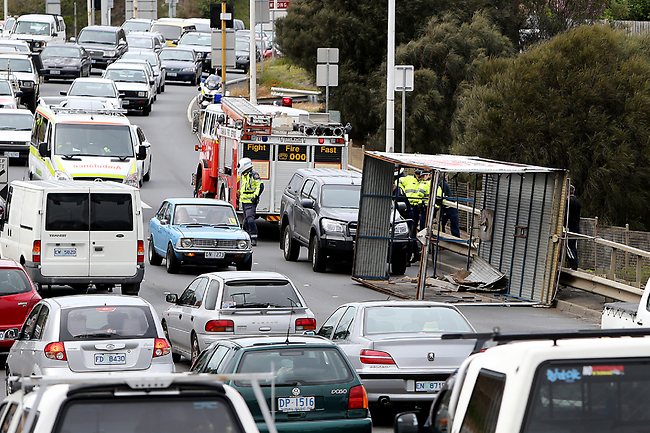 The back of a small rubbish truck blew off on the Tasman bridge creating traffic chaos for city-bound traffic. Picture: Sam Rosewarne