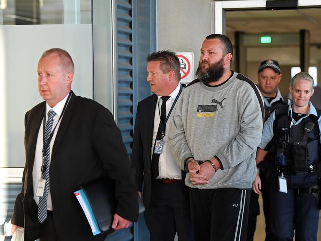 16/05/19 - Steven Hainsworth ,  suspect in the murders of Stephen Newton , Beverley Hanley and Phyllis Harrison arriving at Adelaide airport after being extradited from Melbourne.Picture: Tom Huntley