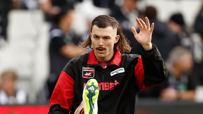 MELBOURNE, AUSTRALIA - APRIL 25: Sam Draper of the Bombers warms up during the 2024 AFL Round 07 match between the Essendon Bombers and the Collingwood Magpies at the Melbourne Cricket Ground on April 25, 2024 in Melbourne, Australia. (Photo by Michael Willson/AFL Photos via Getty Images)