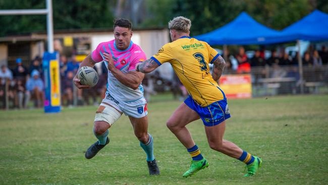 Mitch Simington stepping the defence. Picture: Thomas Lisson