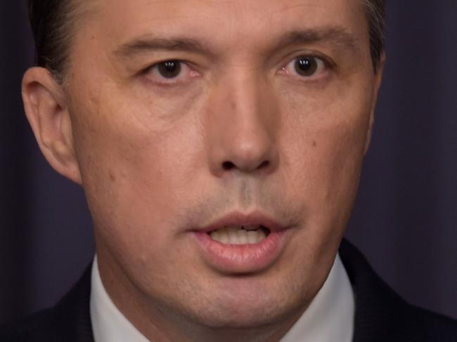 Australian Immigration Minister Peter Dutton speaks to the media during a press conference at Parliament House in Canberra, Thursday, March 17, 2016. (AAP Image/Lukas Coch) NO ARCHIVING