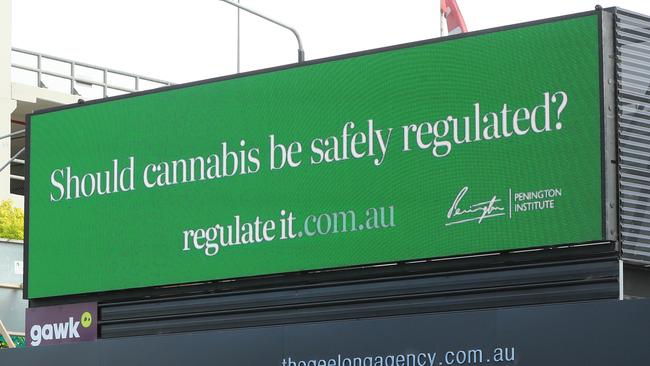 A billboard asking if cannabis should be regulated on the corner of Yarra and Little Malop streets in Geelong. Picture: Alison Wynd