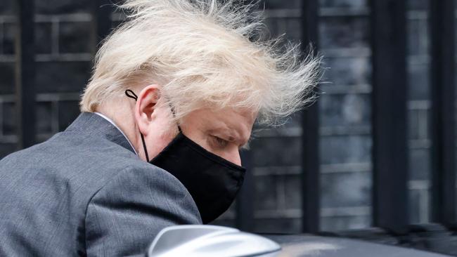 Britain's Prime Minister Boris Johnson, wearing a face mask, leaves 10 Downing Street in central London on January 27. Picture: Tolga Akmen/AFP