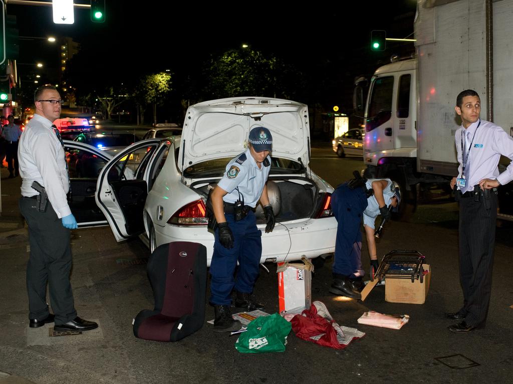 NSW Police arrested three people on Elizabeth St in Surry Hills after it was discoved that the trio were in possession of trafficable quantities of methamphetamine and heroine. Picture: Gordon McComiskie