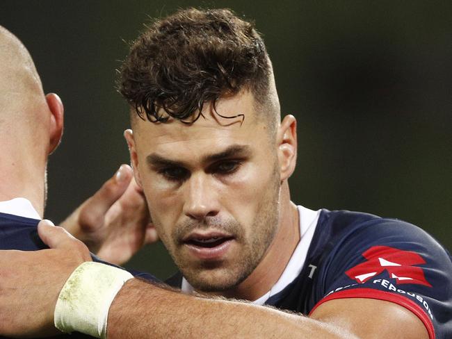 Tom English of the Rebels (right) celebrates a Bill Meakes (centre) try during the Round 3 Super Rugby match between the Melbourne Rebels and the Highlanders at AAMI Park in Melbourne, Friday, March 1, 2019. (AAP Image/Daniel Pockett) NO ARCHIVING, EDITORIAL USE ONLY