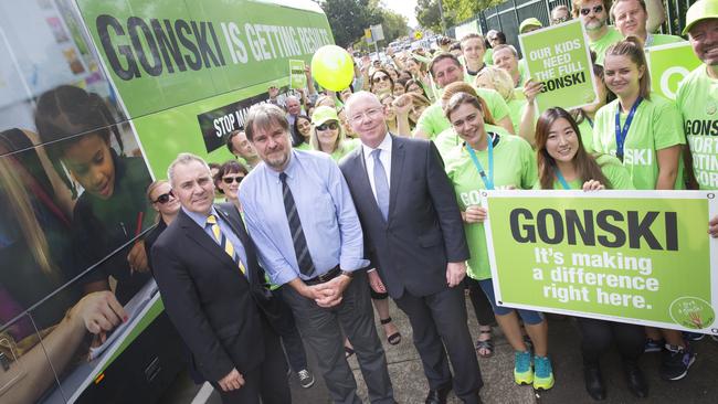 A giant green Gonski bus containing national union AEU members visited Fairfield Public School, pictured with MP Guy Zangari, NSW Teachers Federation president Maurie Mulheron and Hugh McDermott. Picture: Melvyn Knipe