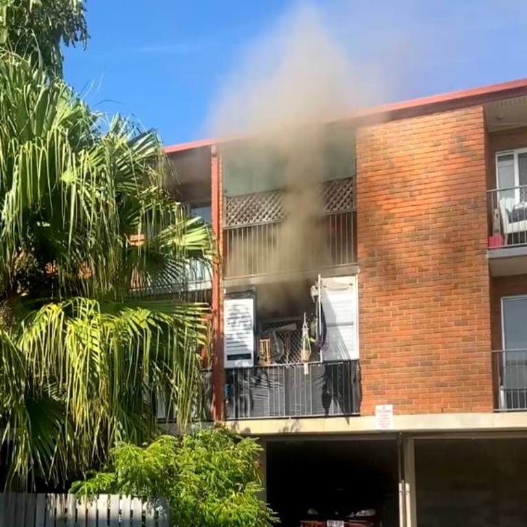 Smoke pours from a New Farm unit following an explosion. Picture: Supplied