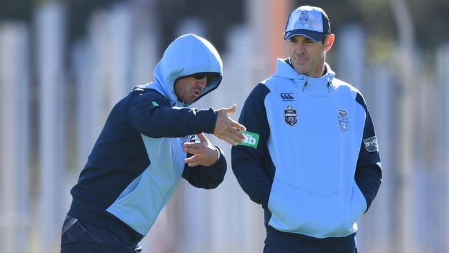 But can he explain those night notes to Brad Fittler? (AAP Image/David Moir)