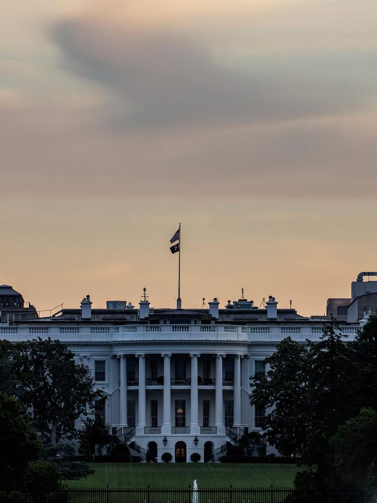 Dawn breaks at the White House in Washington, DC, on May 28. President Joe Biden and Republican leader Kevin McCarthy announced a deal on May 27 to raise the debt ceiling, saving the US from default with only a few days to spare. Picture: Samuel Corum/AFP