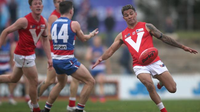 North Adelaide’s Frank Szekely snaps a goal in the Roosters’ win against Central District. Picture: Dean Martin