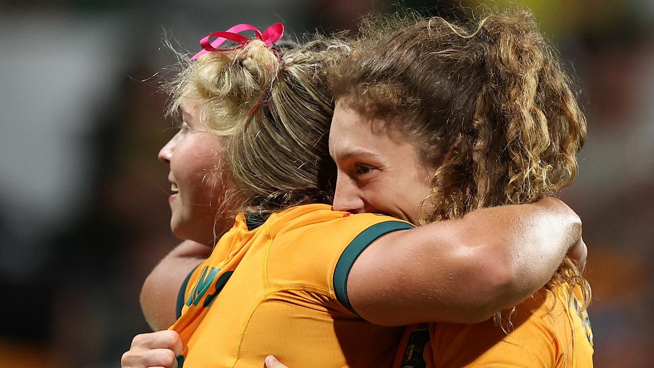 Heidi Dennis and Ruby Nicholas celebrate ending the long drought in Perth. Picture: Paul Kane/Getty Images