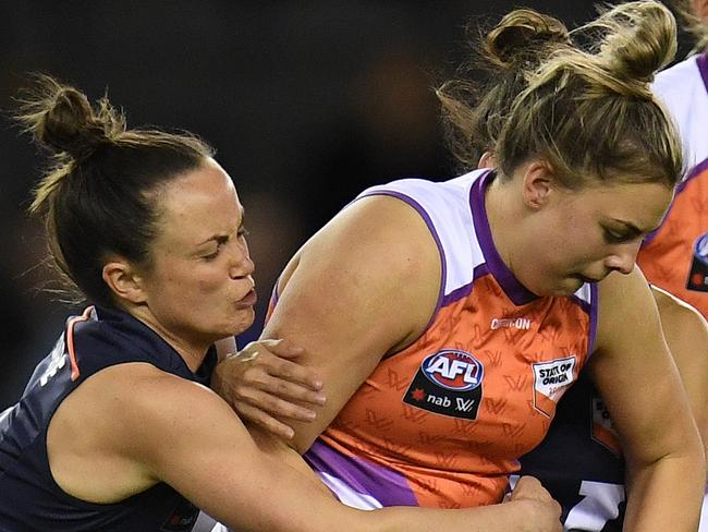 Daisy Pearce of Victoria (left) and Ebony Marinoff of the Allies (third from left) contest during the AFLW State of Origin match between Victoria and the Allies at Etihad Stadium in Melbourne, Saturday, September 2, 2017. (AAP Image/Julian Smith) NO ARCHIVING, EDITORIAL USE ONLY