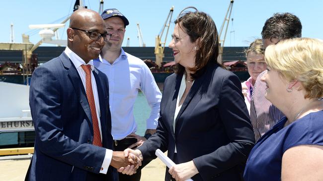 Adani Australia CEO Jeyakumar Janakaraj and Queensland Premier Annastacia Palaszczuk shake hands in Townsville. Picture: Wesley Monts