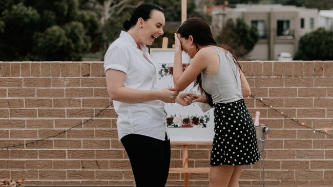 Alyse was surprised by Melissa’s proposal. Picture: James Simpson Photography/My Proposal Co