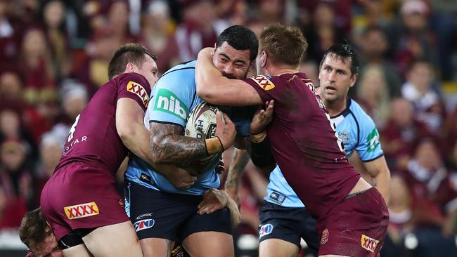 NSW's Andrew Fifita was wrapped up by Queensland — who prepared for the onslaught by taking on Payne Haas. Picture: Brett Costello