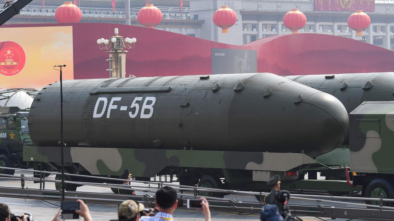 Military vehicles carrying DF-5B intercontinental ballistic missiles participate in a military parade at Tiananmen Square, Beijing. Picture: Greg Baker/AFP