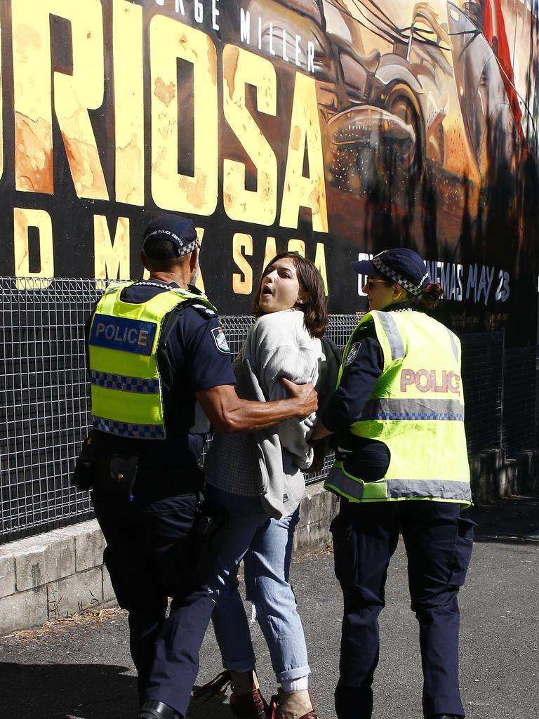 The woman is seen being arrested. Picture: NCA NewsWire/Tertius Pickard