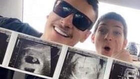 Brock Daniels (right) and his uncle Chandler Daniel (left) with an ultrasound images of Brock's unborn twins. Picture: Facebook