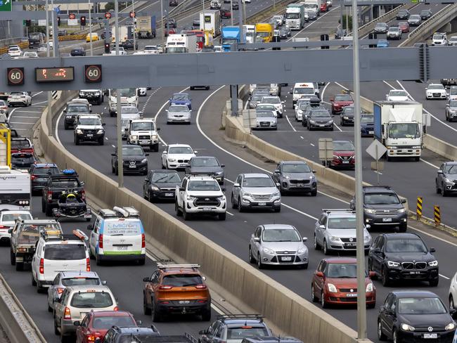 MELBOURNE, OCTOBER 29, 2021: Traffic is banked up heading onto the West Gate Freeway on Friday afternoon as Melburnians are able to travel to regional Victoria after lockdown restrictions eased.Picture: David Geraghty