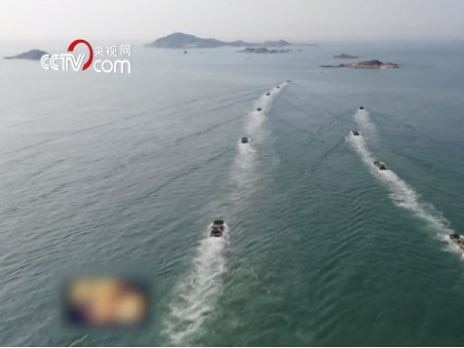 Chinese amphibious assault troops practise invading an island in a recent military exercise. Picture: CCTV