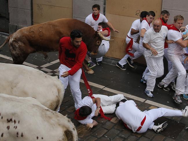 Gruesome scene: Two Australians among those gored during running of the ...