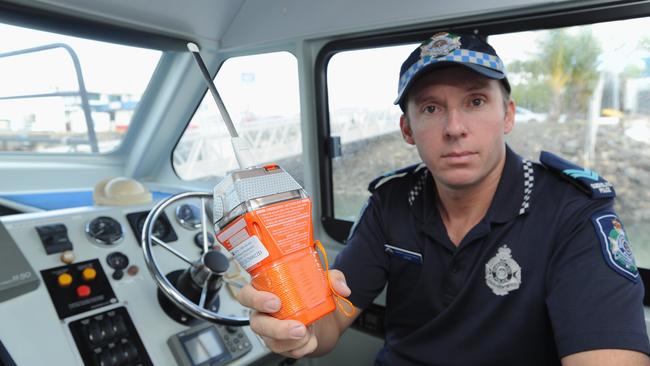 Senior Constable Shannon Gray with a current EPIRB. Photo: Alistair Brightman.