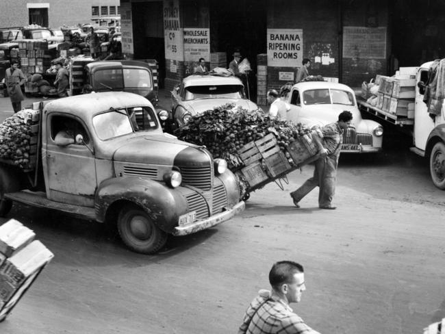 City fruit and vegetable markets at Haymarket in Sydney in early morning in 1958 photo. Historical