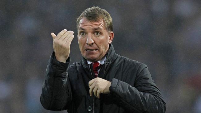 Liverpool's Northern Irish manager Brendan Rodgers gestures the English Premier League football match between West Ham United and Liverpool at The Boleyn Ground, Upton Park, in east London on September 20, 2014. AFP PHOTO/IAN KINGTON RESTRICTED TO EDITORIAL USE. No use with unauthorized audio, video, data, fixture lists, club/league logos or “live” services. Online in-match use limited to 45 images, no video emulation. No use in betting, games or single club/league/player publications.