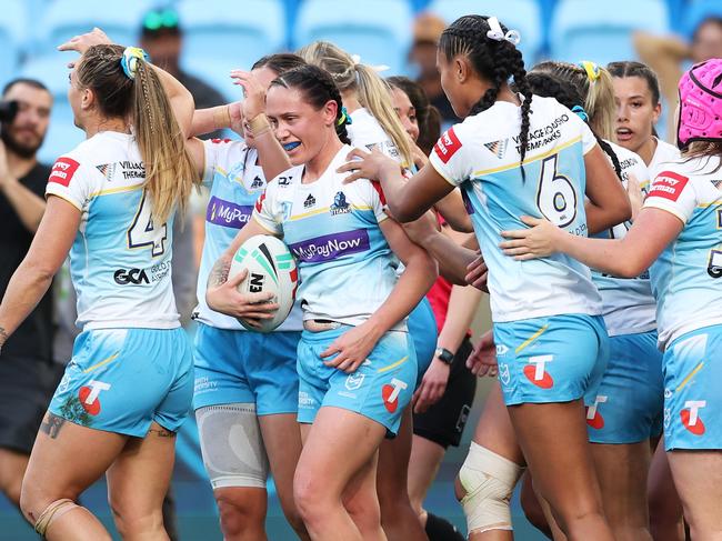 SYDNEY, AUSTRALIA - SEPTEMBER 24:  Brittany Breayley-Nati of the Titans celebrates with team mates after scoring a try during the NRLW Semi Final match between Sydney Roosters and Gold Coast Titans at Allianz Stadium, on September 24, 2023, in Sydney, Australia. (Photo by Matt King/Getty Images)