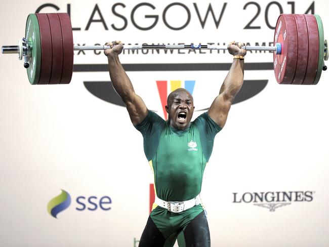 Rawwwr! Simplice Ribouem in the Men's 94kg weightlifting final. Picture: Andy Buchanan