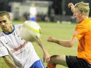 Woombye defeated Buderim 3 to 1 at Ballinger Park. Woombye’s Arron Buckley challenges Buderim’s Shaun Callanan. Picture: Barry Leddicoat