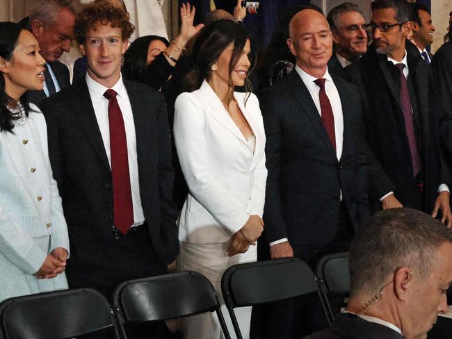 (L-R) Priscilla Chan, Meta founder Mark Zuckerberg, Lauren Sanchez, Amazon founder Jeff Bezos, Google CEO Sundar Pichai and Tesla CEO Elon Musk attend the inauguration ceremony before Donald Trump is sworn in as the 47th US President in the US Capitol Rotunda in Washington, DC, on January 20, 2025. (Photo by Chip Somodevilla / POOL / AFP)