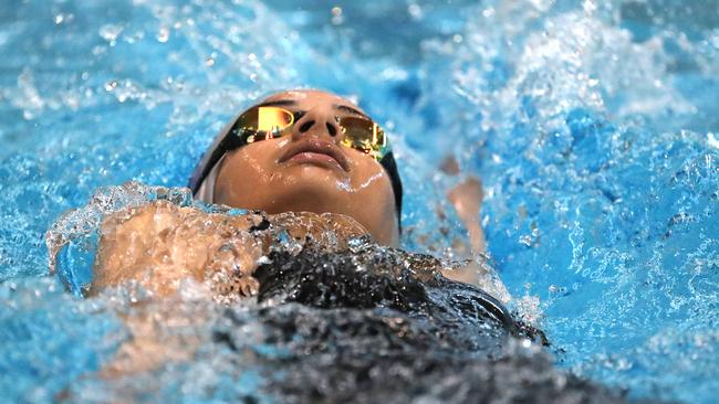 Chand Dhatt of AquaBlitz Toongabbie competing in the 11 Girls 100m Backstroke.